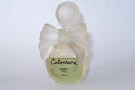 Photo © Les-parfums.info le site Grès - Cabochard - Flacon du parfum 15 ml Noeud et bouchon en verre Hauteur 8.1 cm