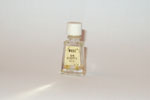 Photo © Les-parfums.info le site Coty - Muse - Etiquette Doré bouchon Strié Hauteur 4 cm