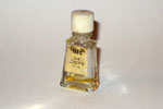 Photo © Les-parfums.info le site Coty - Paris - Etiquette doré bouchon Strié Hauteur 4 cm