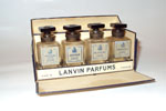 Photo © Les-parfums.info le site Lanvin - Mon Péché Arpège Scandale Pretexte - ParfumCoffret de 4 Extrait bouchon Emeri Hauteur de flacons 4.7 cm 