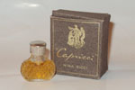 Photo © Les-parfums.info le site Ricci Nina - Capricci - Miniature Resille Bouchon plastique tétine caoutchouc Hauteur 2.9 cm