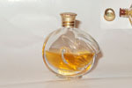 Photo © Les-parfums.info le site Ricci Nina - L'Air du Temps - Flacon de sac Hauteur 5.2 cm bouchon métal tétine caoutchouc 