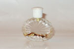 Photo © Les-parfums.info le site Ricci Nina - L'Air du Temps - Mini rayonnant bouchon plastique hauteur 4 cm