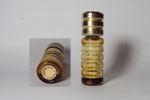 Photo © Les-parfums.info le site Carven - Robe D'un Soir - Flacon de sac bouchon dorée étiquette doré hauteur 6.9 cm