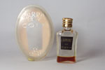 Photo © Les-parfums.info le site Coty - L'Aimant - Hauteur 4.7 cm dans une boite plexi 