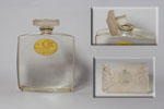 Photo © Les-parfums.info le site Coty - L'Or - Flacon en crista bouchon émei  decor d'abeille sur le bouchon hauteur 8.3 cm 