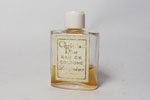 Photo © Les-parfums.info le site Dior Christian - Diorissimo - Eau de cologne bouchon blanc en bakélite hauteur 3.8 cm 