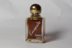 Photo © Les-parfums.info le site Pinaud - Escapade - Bouchon Laiton Hauteur 4 cm