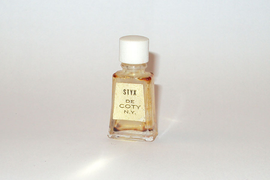 Miniature Styx de Coty Etiquette doré bouchon Strié Hauteur 4 cm 