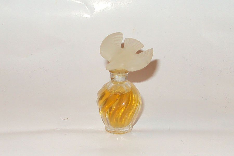 Miniature L'Air du Temps de Ricci Nina Parfum bouchon plastique 1 colombe Hauteur 4.5 cm 
