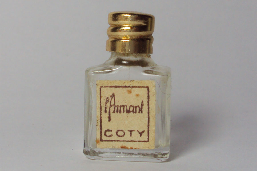 Miniature L'Aimant de Coty Bouchon métal Hauteur 2.7 cm 