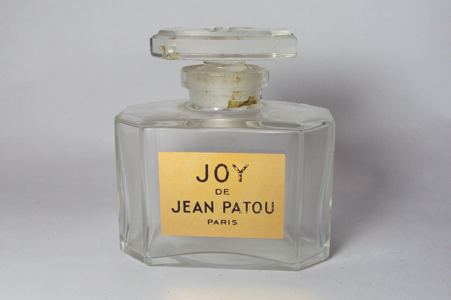 Miniature Joy de Patou Flacob en cristal Bouchon usiné Gros éclat au col hauteur 6.7 cm  