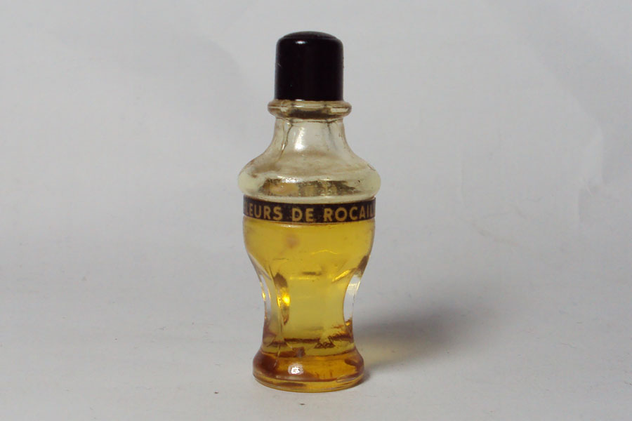 Miniature Fleurs de Rocaille de Caron Huile de Parfum bouchon bakélite noire Hauteur 5 cm 