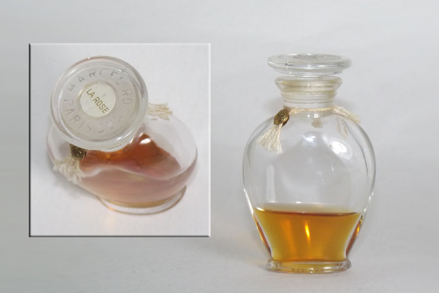 Photo © La Rose - Flacon du parfum Hauteur 6.4 cm Bouchon en verre émerisé bloqué  